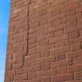 What are the most common causes of masonry damage?