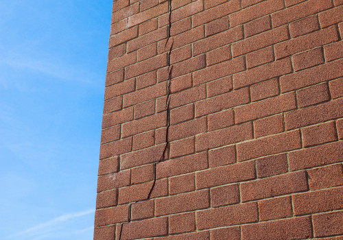 What are the most common causes of masonry damage?
